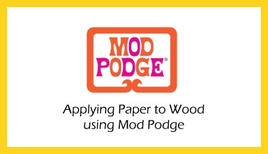 Applying Paper to Wood Using Mod Podge 
